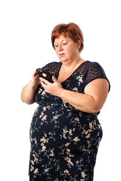 スマートフォンを持っている女性 ロイヤリティフリーのストック画像