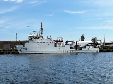 NOAA Ship Nancy Foster is seen docked at the Port of Pensacola, Florida. Scientists aboard Nancy Foster use onboard tools for various missions, including characterizing habitats and fauna in marine sanctuaries and coastal waters, conducting surveys,  clipart