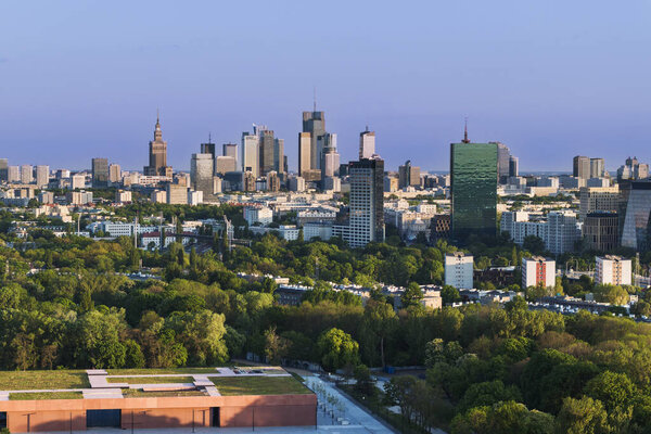 Aerial, drone panorama of Warsaw city during sunset. View from Zoliborz district of Warsaw.