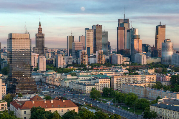 Aerial, drone panorama of Warsaw city during sunset. View from Muranow district of Warsaw.