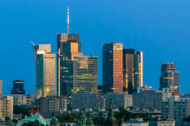 Panorama of Old Town and downtown of Warsaw from drone perspective during sunset
