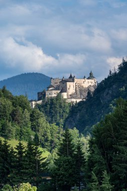 Hohenwerfen Castle was built on a rock, about 40 km south of Salzburg. The castle is majestically surrounded by the Berchtesgaden Alps and the Tennengebirge mountain range. clipart