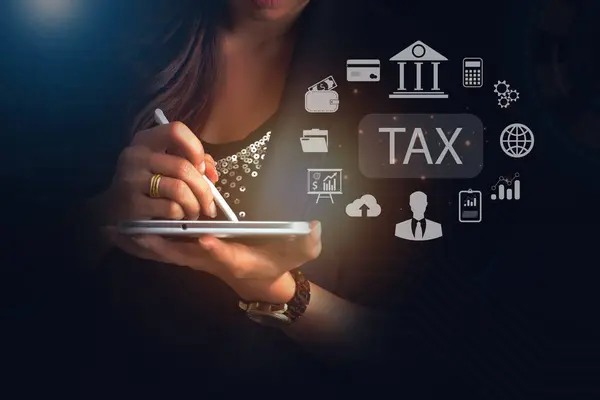 E-tax concept. Businesswoman show TAX for Individual income tax return form online for tax payment. Government, state taxes. Data analysis, paperwork, financial research, report.