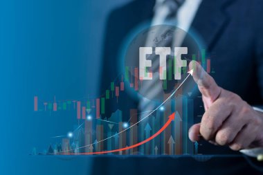 İşadamı ETF 'yi (Ticaret Fonları) çeşitlendirmeye işaret ediyor. ETF Borsası borsa ticaret yatırımı finansal konseptini takas etti.