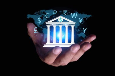 Sanal ekranda bankacılık simgesiyle dünyayı tutan bir iş adamı. Bankacılık sektörünün finans kurumunun büyümesi. Finans ve Çevrimiçi bankacılık ağı. para birimi değişimi. 