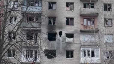 Destroyed Houses. War in Ukraine. Hole in the wall. Shelled damaged houses.
