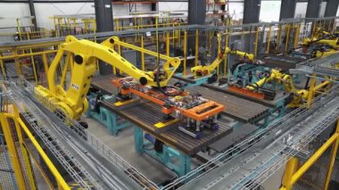 Modern automated machine tool welds metal.