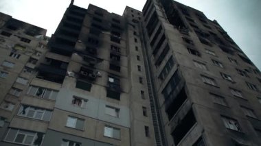 Destroyed Houses. War in Ukraine. Hole in the wall. Shelled damaged houses.