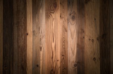 Zarif ahşap arka plan dikkatleri çekmek için vignetting ile güzelce aydınlatılmış. Stüdyo resmi, hoş bir renk ve gerçek eski ahşap.