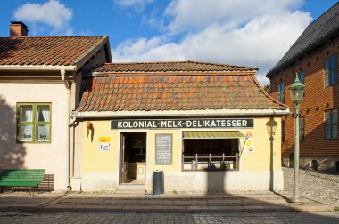 OSLO, NORWAY - AUGUST 29, 2016: Kolonial - melk - delikatesser - The Grocery Store in the Old Town in Norwegian Folk Museum (The Norwegian Museum of Cultural History- Norsk Folkemuseum) in Oslo. clipart