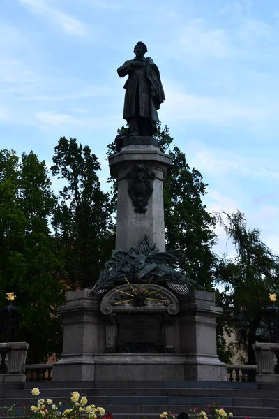 WARSAW, POLAND - JUL 10: Adam Mickiewicza Monument in Warsaw, Poland, as seen on July 10, 2022.
