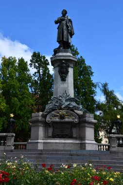 WARSAW, POLAND - JUL 10: Adam Mickiewicza Monument in Warsaw, Poland, as seen on July 10, 2022.