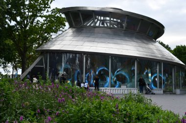 NEW YORK, NY - JUN 18: State Of The Art SeaGlass Carousel at The Battery Park in Lower Manhattan, as seen on June 18, 2022. A new, state-of-the-art carousel featuring 30 large, luminescent fish has opened in Battery Park.