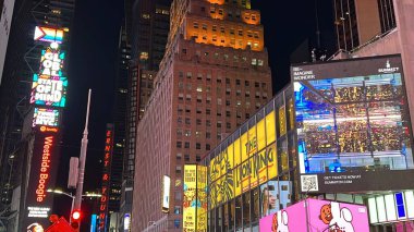 NEW YORK, NY - JUN 18: Times Square, featured with Broadway Theaters and animated LED signs, in Manhattan, as seen on Jun 18, 2022. It is a symbol of New York City and the United States.