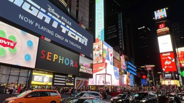 NEW YORK, NY - JUN 18: Times Square, featured with Broadway Theaters and animated LED signs, in Manhattan, as seen on Jun 18, 2022. It is a symbol of New York City and the United States.