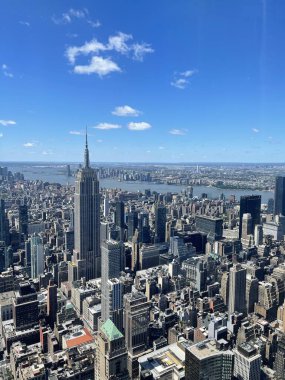 NEW YORK, NY - JUN 19: View of Manhattan including the Empire State Building from The Summit observation deck at One Vanderbilt in Manhattan, New York City, as seen on June 19, 2022.