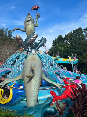 ORLANDO FL - DEC 30: One Fish Two Fish Red Fish Blue Fish ride at Seuss Landing at Universal Islands of Adventure in Orlando, Florida, as seen on Dec 30, 2022.