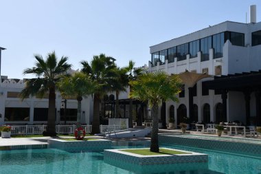 DOHA QATAR - FEB 11: Sharq Village & Spa, a Ritz-Carlton Hotel, in Doha, Qatar, as seen on Feb 11, 2023. clipart