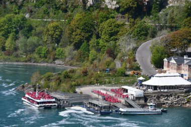 NIAGARA FALLS ON - MAY 27: Hornblower Niagara Cruises tourist boat at Niagara Falls, Ontario, in Canada, as seen on May 27, 2023. clipart