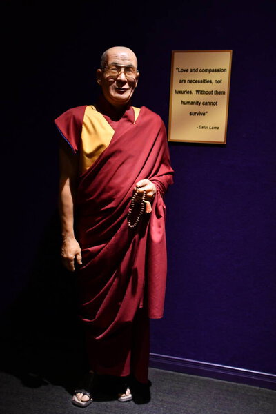 NIAGARA FALLS ON - MAY 28: Dalai Lama statue at Louis Tussauds Waxworks at Clifton Hill at Niagara Falls in Ontario, Canada, as seen on May 28, 2023.