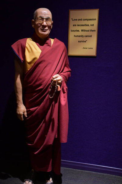 NIAGARA FALLS ON - MAY 28: Dalai Lama statue at Louis Tussauds Waxworks at Clifton Hill at Niagara Falls in Ontario, Canada, as seen on May 28, 2023.