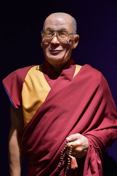 NIAGARA FALLS ON - MAY 28: Dalai Lama statue at Louis Tussauds Waxworks at Clifton Hill at Niagara Falls in Ontario, Canada, as seen on May 28, 2023.