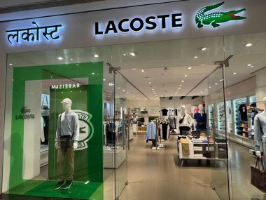 MUMBAI, INDIA - FEB 23: Lacoste store at Phoenix Marketcity Mall in the Kurla area of Mumbai, India, as seen on Feb 23, 2024. clipart