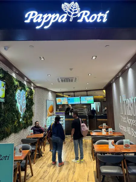 stock image DELHI, INDIA - FEB 19: Pappa Roti at Indira Gandhi International Airport in Delhi, India, as seen on Feb 19, 2024.