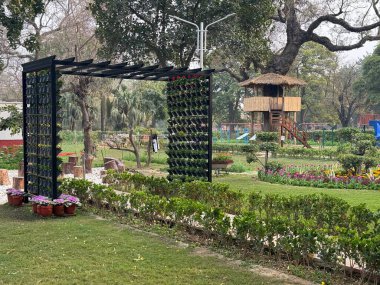 DELHI, INDIA - FEB 18: Mughal Gardens (Amrit Udyan) at the Rashtrapati Bhavan grounds in New Delhi, India, as seen on Feb 18, 2024. clipart