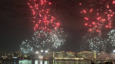 ABU DHABI, UAE - DEC 31: New Years fireworks at Yas Bay Waterfront in Abu Dhabi, UAE, as seen on Dec 31, 2023. clipart