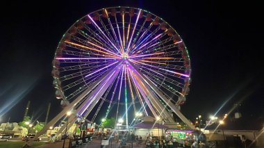 BRANSON, MO - JUL 2: ELECTRIFY A Music & Light Spectacular show at the Branson Ferris Wheel in Missouri, as seen on July 2, 2023. clipart