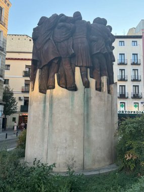 MADRID, SPAIN - AUG 18: Monumento a los abogados de Atocha (Monument to the Atocha lawyers) (El Abrazo - The Hug) in Madrid, Spain, as seen on Aug 18, 2024. clipart