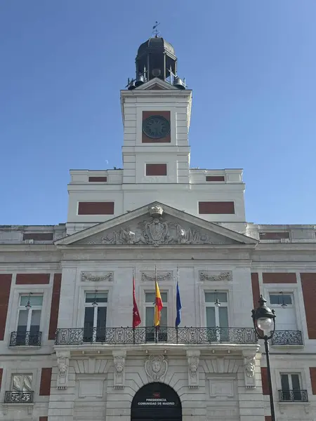 stock image MADRID, SPAIN - AUG 11: Real Casa de Correos (Royal House of the Post Office) at Puerta del Sol, in Madrid, Spain, as seen on Aug 11, 2024.