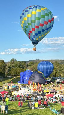 UNION VALE, New York - 30 Ağustos 2024 'te Union Vale, New York' taki Tymor Park 'ta görülen yıllık JPMorgan Chase Hudson Vadisi Sıcak Hava Balonu Festivali.