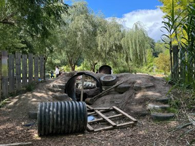 ITHACA, NY - SEP 2: Hands-On-Nature Anarchy Zone at Ithaca Childrens Garden in Ithaca, New York, as seen on Sep 2, 2024. clipart