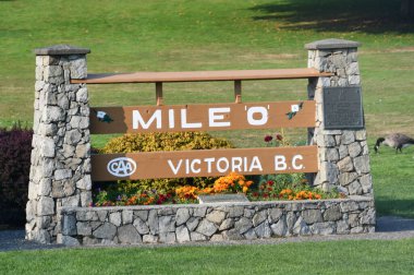 VICTORIA, BC, CANADA - AUG 27: Mile Zero Monument of 5000-mile-long Trans-Canada Highway in Victoria, British Columbia, in Canada, as seen on Aug 27, 2023. clipart