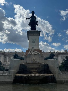 MADRID, SPAIN - AUG 14: Statue of Felipe IV at Plaza de Oriente in Madrid, Spain, as seen on Aug 14, 2024. clipart