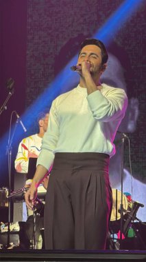 CARTERET, NJ - NOV 22: Ayushmann Khurrana performing live in Carteret, New Jersey, as seen on Nov 22, 2024. clipart