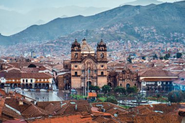 Cusco, Peru. Cityscape view of the central square, the old town and the Andes.