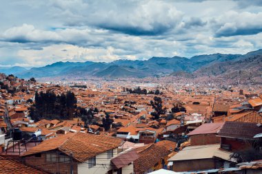 Cusco, Peru. Orange tiles on the roofs of houses. Top view of the old city. Urban landscape.