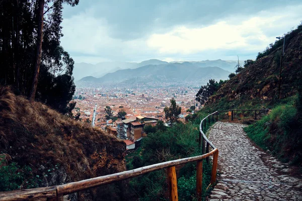 Mountain landscape. A stone path in the mountains overlooking Cusco, Peru.