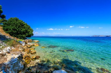 Beautiful scene from turquoise sea.Tarsanas Beach, Thassos, Greece clipart
