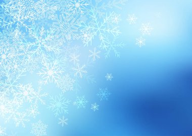 Mavi çözünmüş arka planda Noel kar taneleri