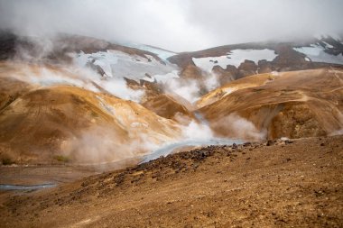 Geothermal Valley with Steam Vents and Lush Greenery clipart