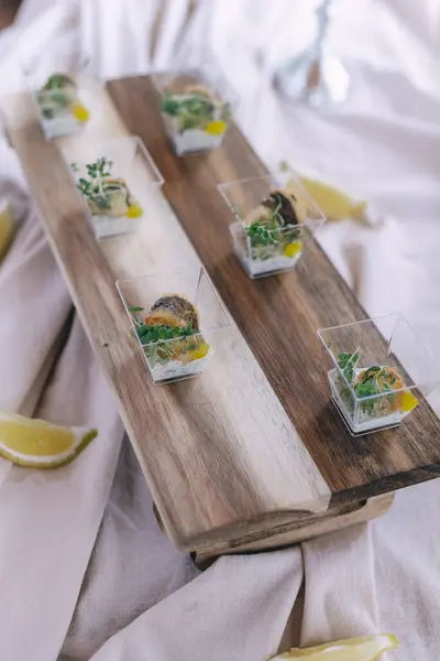 stock image Elegant Appetizers on Wooden Serving Board