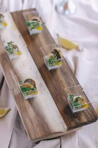 stock image Elegant Appetizers on Wooden Serving Board