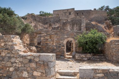 Dilapidated houses oand ruins on Spinalonga island in Crete