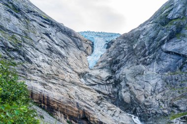 Briksdal Glacier in Jostedal Glacier Park near Olden in Norway Europe clipart