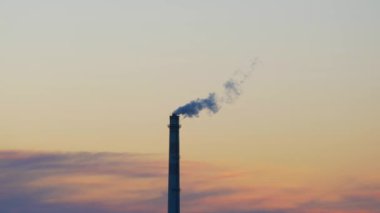 Smoke or steam coming from the chimney of the coal powered power station