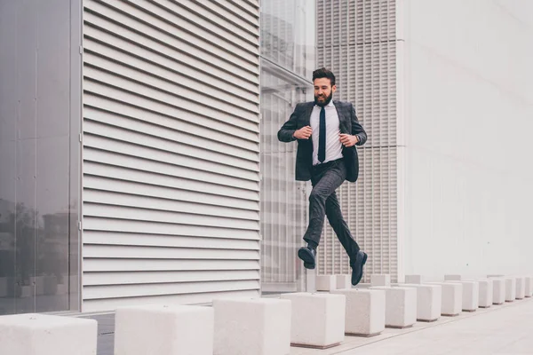 Energetic Young Bearded Professional Businessman Jumping Mid Air — Stock fotografie